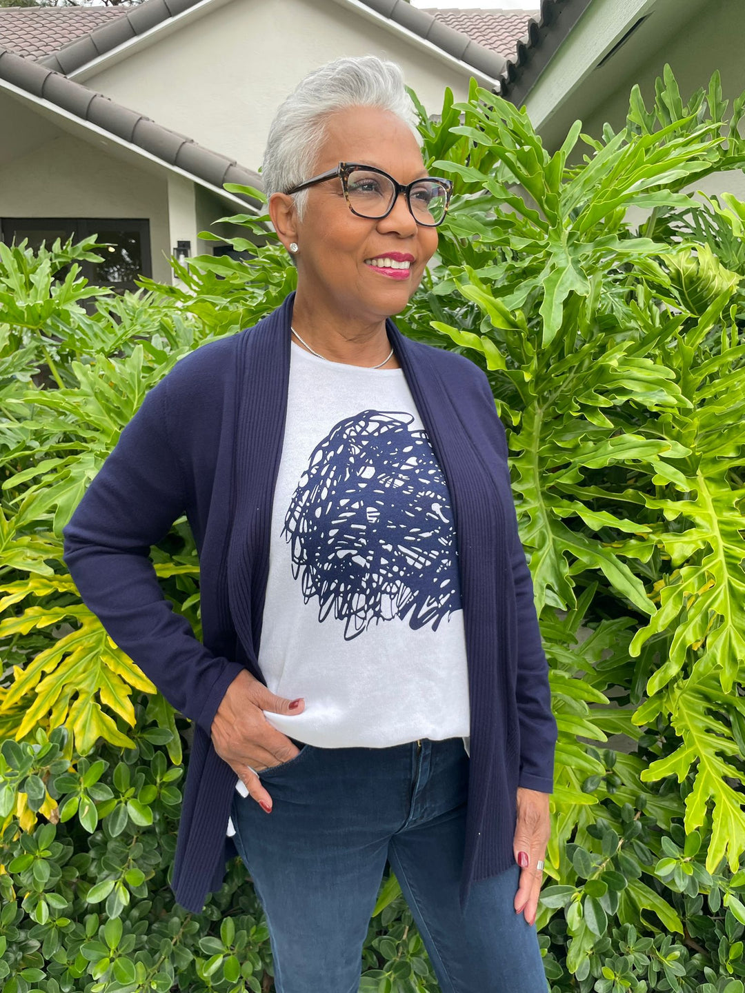 BK Monic Graphic Tee in White/Navy layered with BK Luisa Cardigan in Navy, Paired with Mother Te Weekender Fray Jeans in Chip On My Shoulder available at Barbara Katz