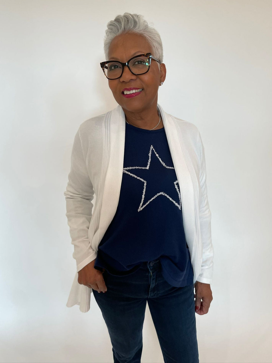 BK Eva Star Top in Navy/White layered with BK Luisa Cardigan in White, paired with Mother The Weekender Fray Jeans  in Chip On My Shoulder  available at Barbara Katz