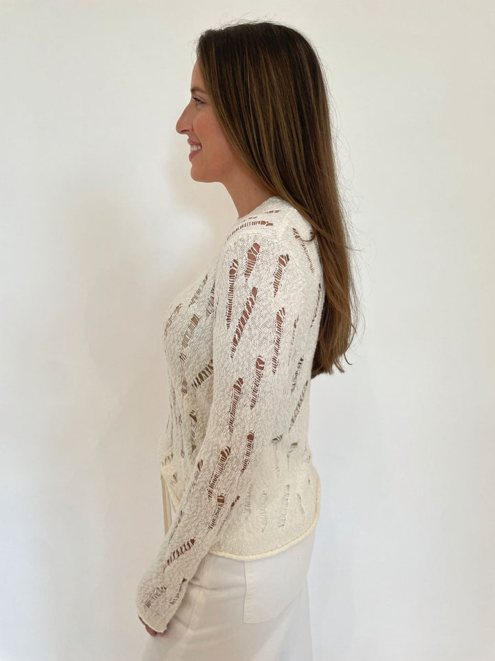 Autumn Cashmere Lucy Distressed Ladder Stitch Crew Long Sleeve Sweater in Starch available at Barbara Katz