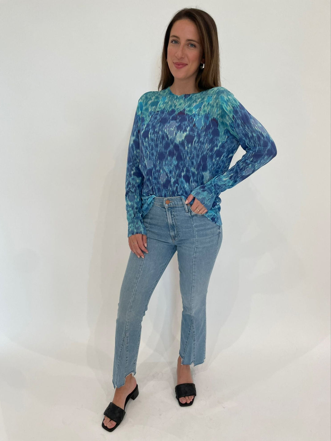 Autumn Cashmere Grace Gradient Botanic Print Distressed Crew Sweater in Blue Combo paired with Mother Denim The Insider Crop Pointy Fray Jeans in Let's Get It Together available at Barbara Katz