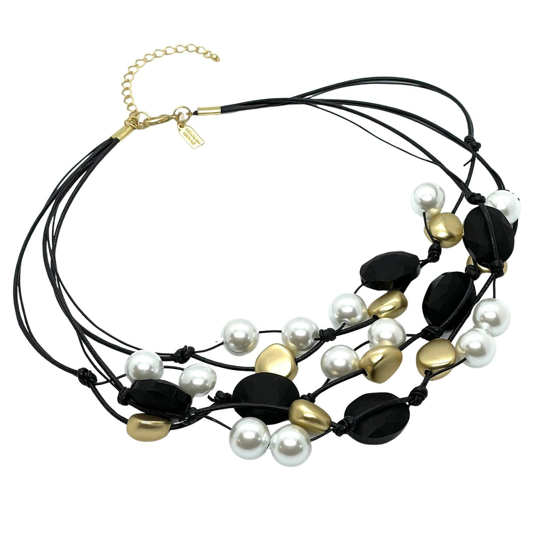 Deborah Grivas Matte Black Crystal, White 12mm Glass Pearl, Matte Gold Pebble Bead Torsade Necklace on Black Waxed Linen And Leather