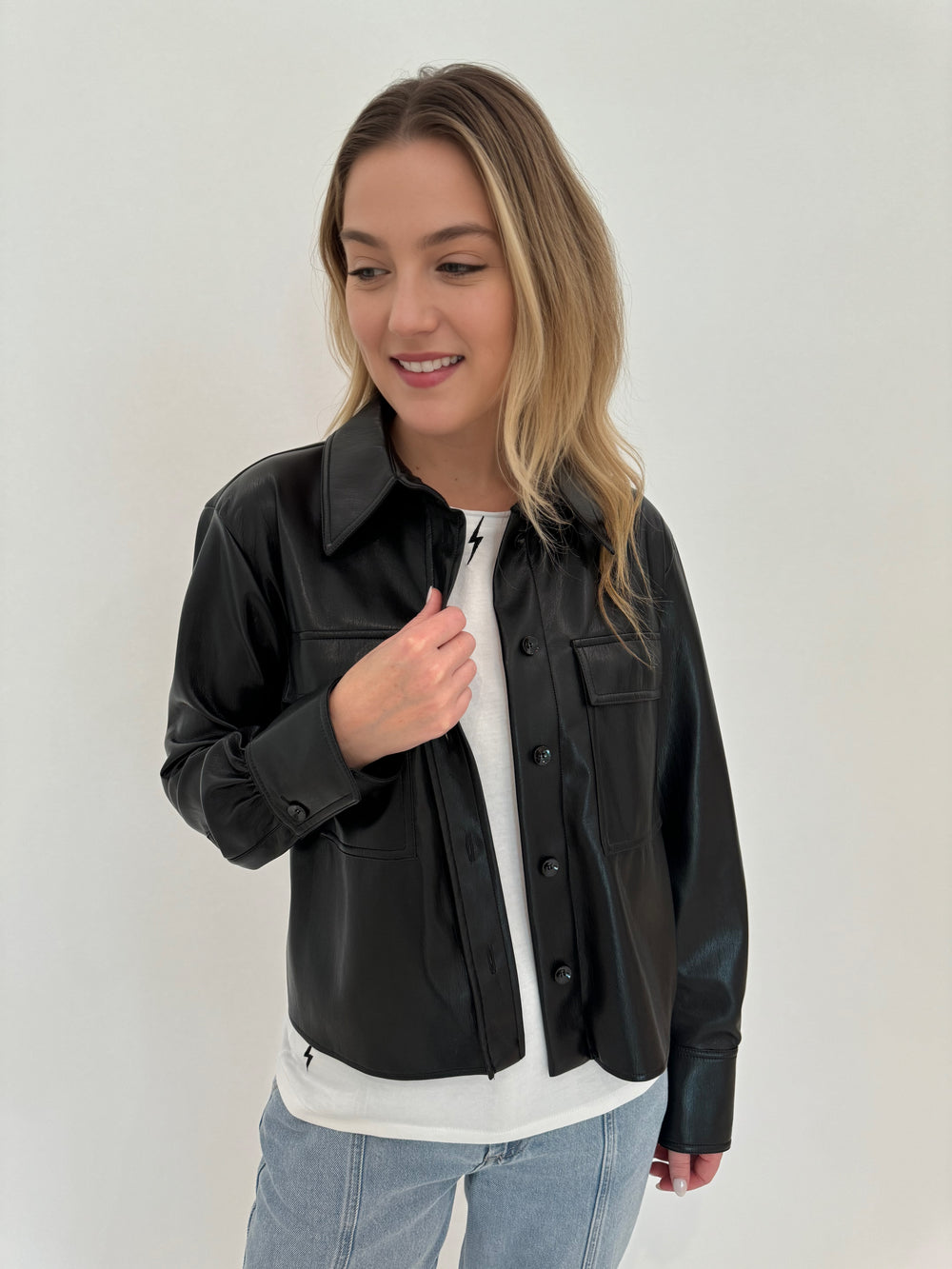 Marella Book Button Down Vegan Leather Jacket in Black with Catherine Gee Embroidered Lighting Bolt Tee in White underneath