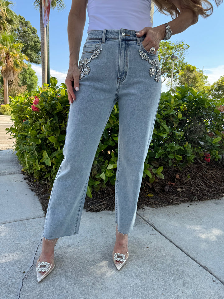 Generation Love Carolyn Crystal Denim Pants in Light Blue, straight-leg jeans with front zipper and denim shank, crystal appliques on pockets, boyfriend fit, 31" inseam, and raw hem