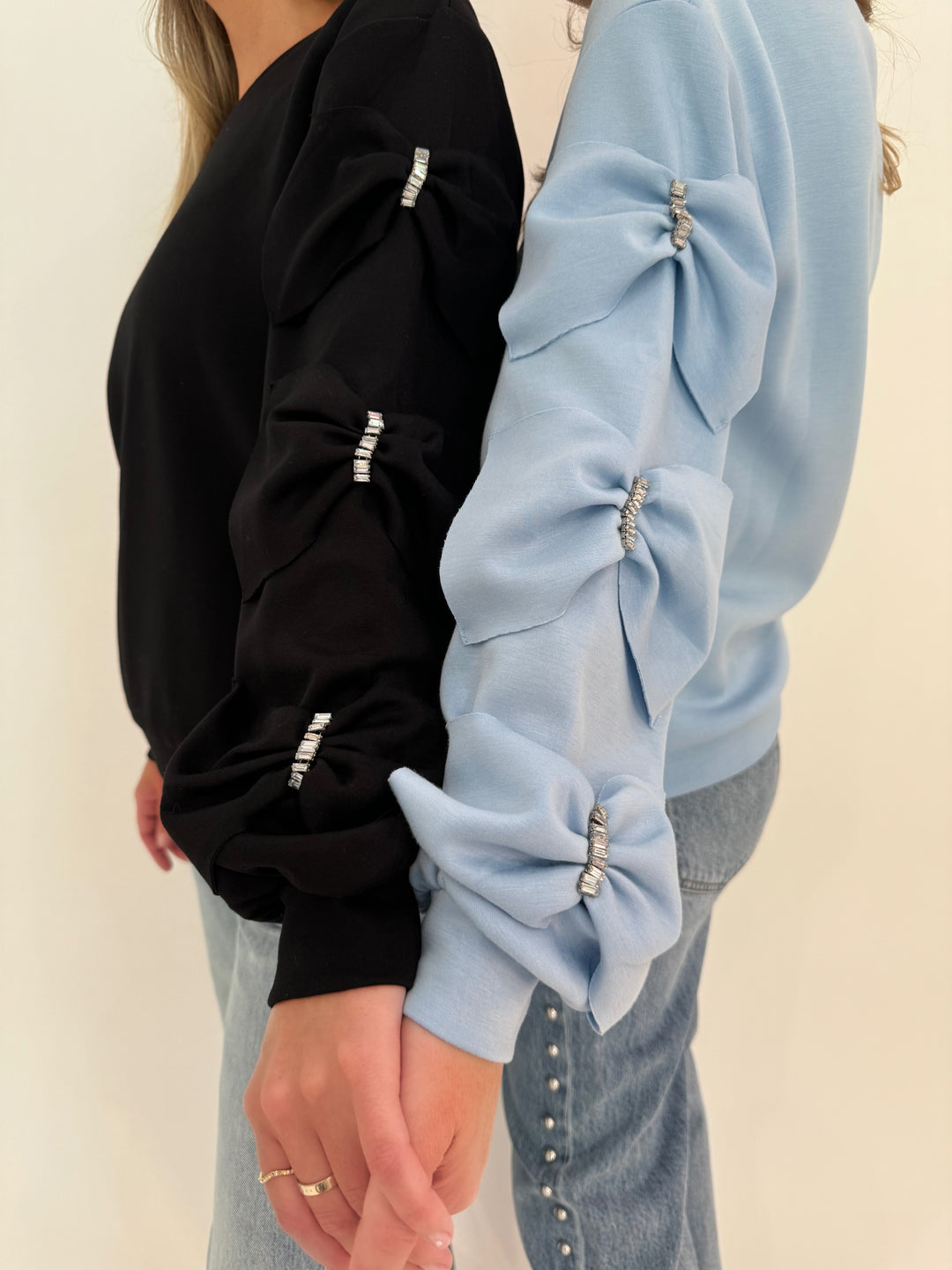 Leo & Ugo Bow Sleeve Sweatshirts in Black and Sky Blue available at Barbara Katz