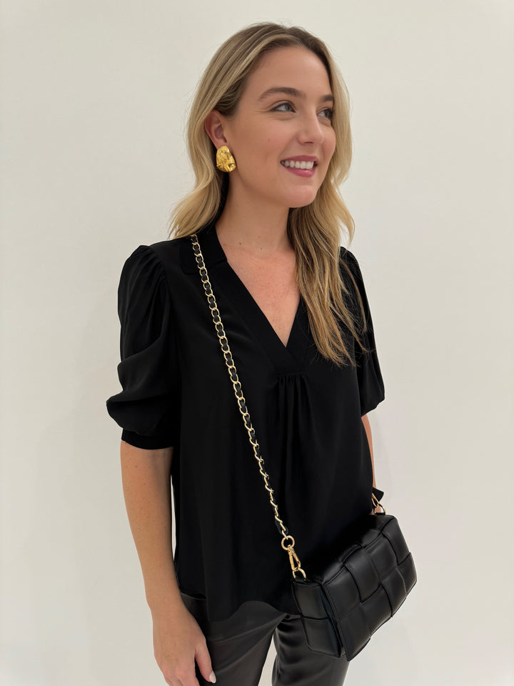 Cinq a Sept Weldon V-Neck Top in Black with Mignonne Gavigan Christopher Stud Earrings in Gold and BK Square Weave Leather Bag in Black - all available at Barbara Katz