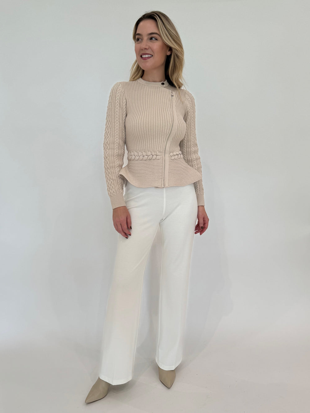 Simkhai Signature Andi Peplum Jacket in Stone paired with Peace of Cloth Jules Paramount Knit Pants in Oyster available at Barbara Katz