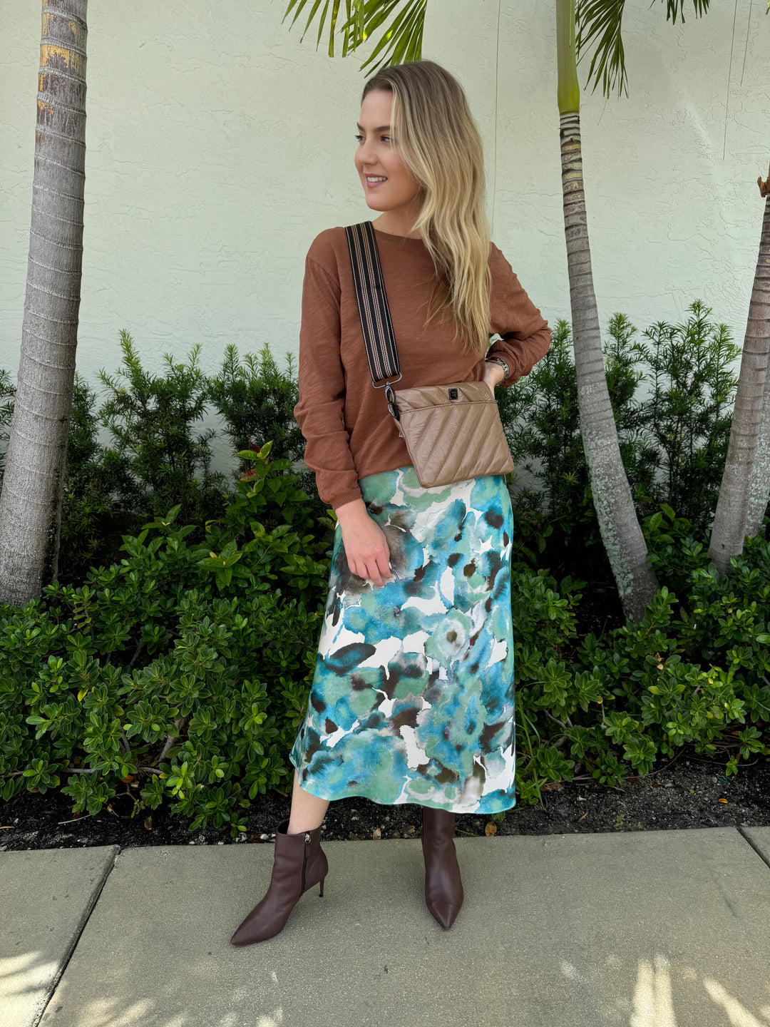 Rails Anya Midi Skirt in Verbena paired with Elliott Lauren Balloon Sleeve Tee in Chestnut, and Think Royln Diagonal Bum Bag in Glossy Latte