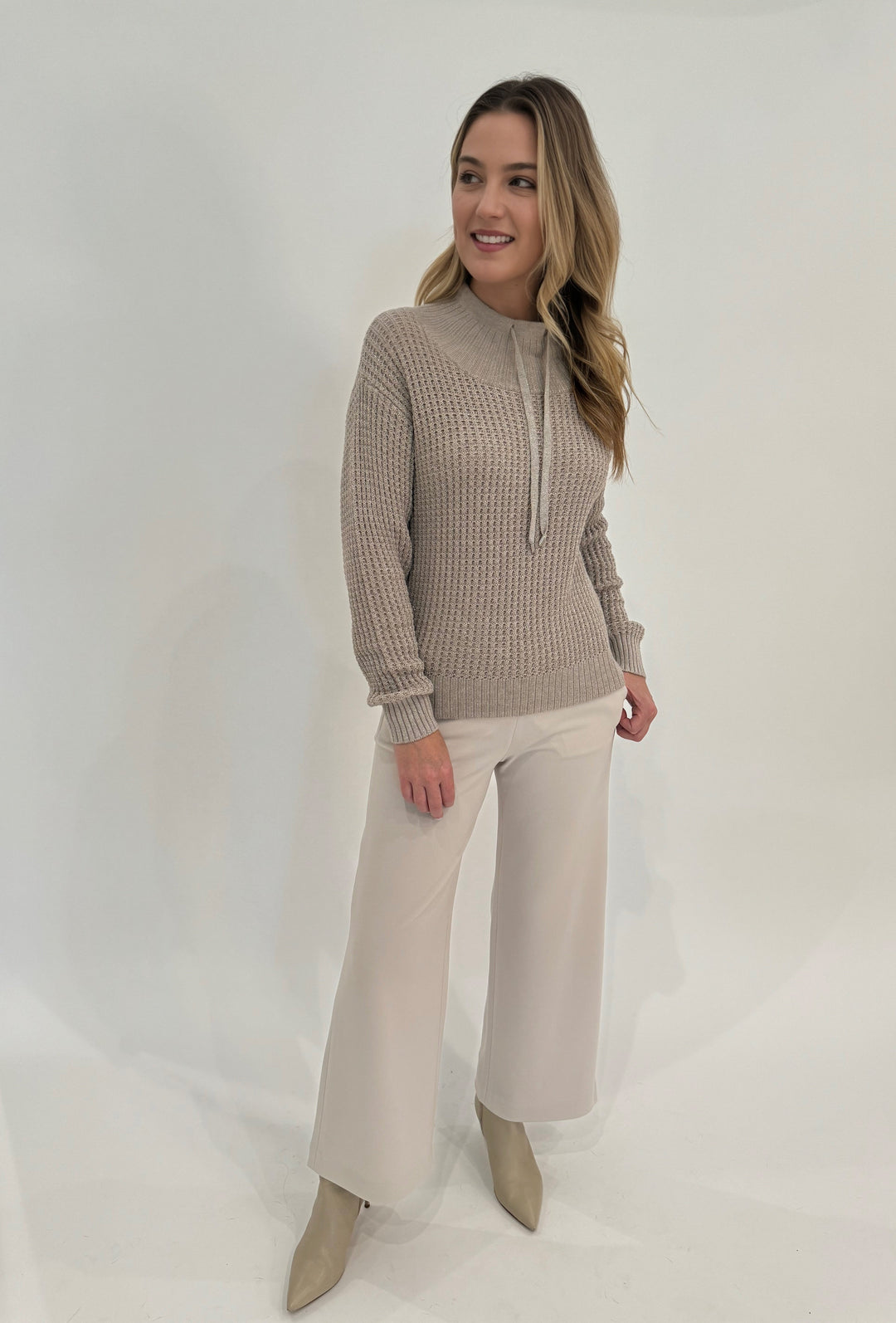 Barbara Katz Molly Lurex Thermal Sweater in Biscotti paired with Max Mara Quiete Denim-Effect Jersey Trousers in Beige