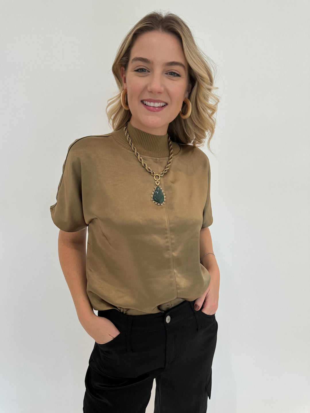 Melissa Nepton Janis Satin Tee in Brass with Mignonne Gavigan Graham Charm Necklace and BK Martha Chunky Metal Hoop Earrings available at Barbara Katz