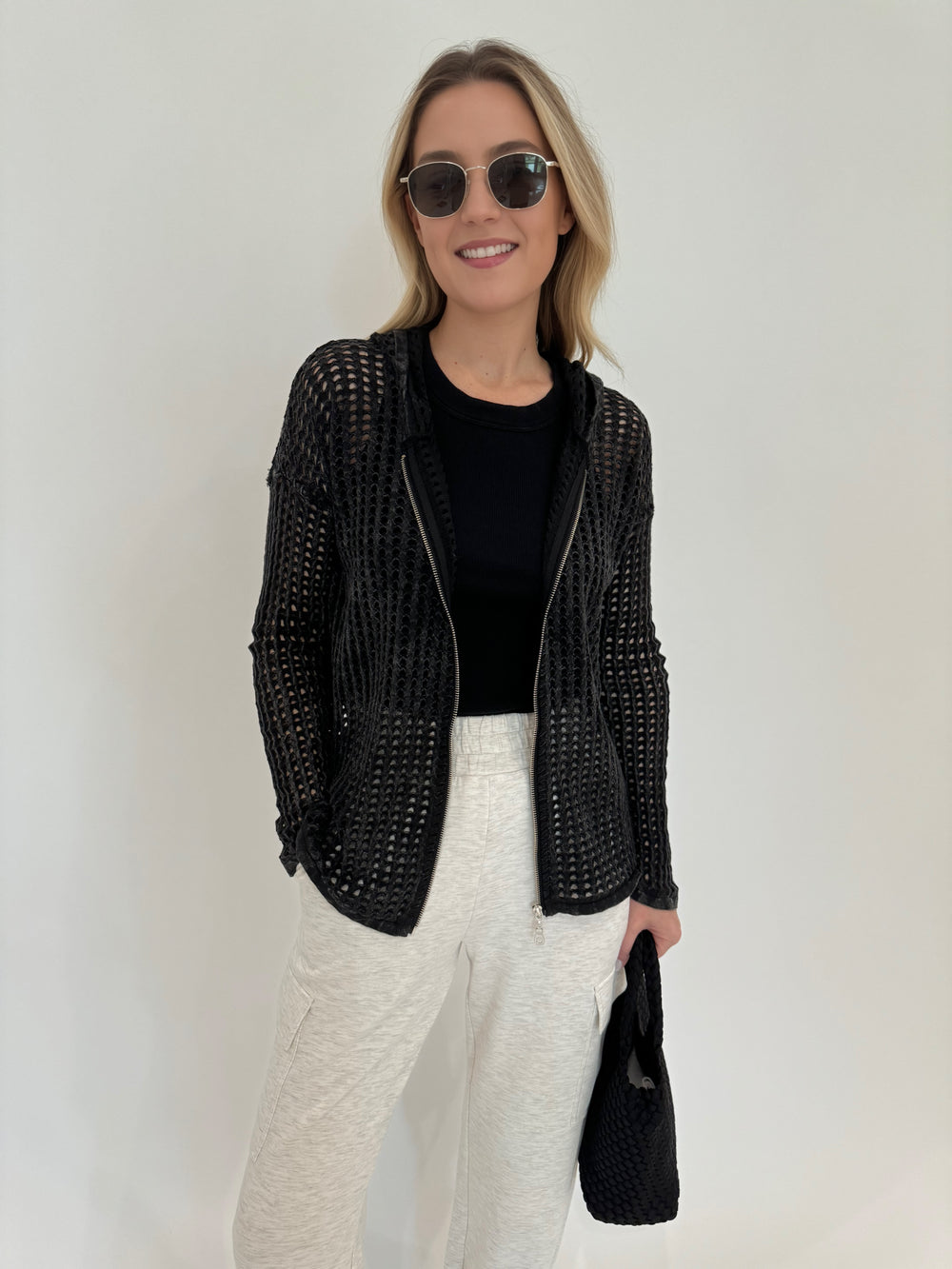 Barbara Katz Zip-Up Stone Wash Mesh Sweater in Charcoal paired with Varley The Cargo Pant 25" in Ivory Marl