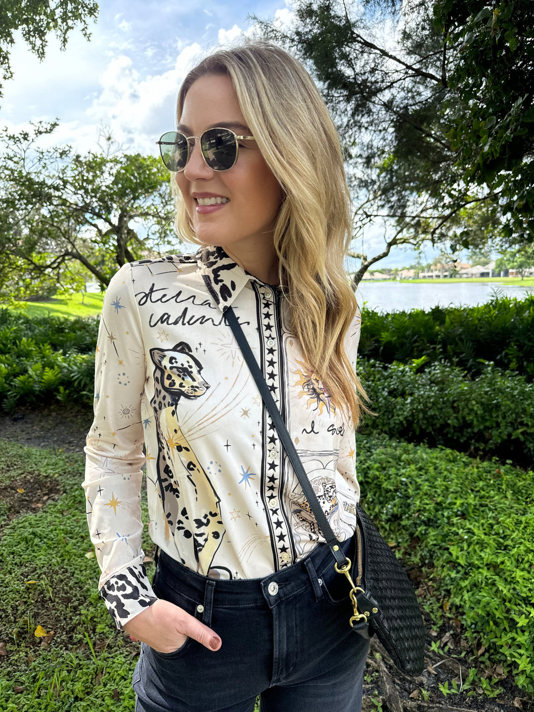 Oui Leopard Silky Shirt Blouse paired with Citizens of Humanity Lyra Crop Wide Leg Denim Jeans in Medallion, Le Specs Neptune Deux Sunglasses, Clare V Petit Moyen Messenger Bag in Black Woven Checker - all available at Barbara Katz