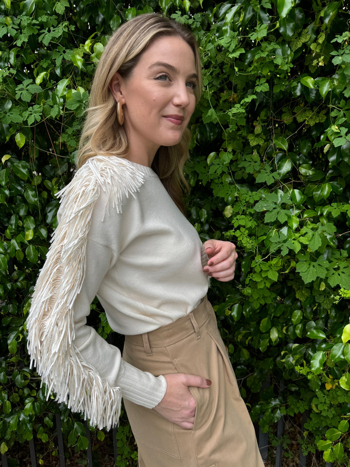 D.Exterior Fringe Sleeve Crew Sweater in Latte available at Barbara Katz