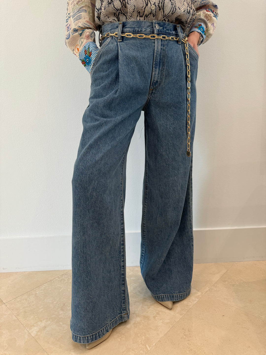 Agolde Ellis Wide Leg Trouser in Baffle, vintage inspired denim pants in medium indigo wash with zipper fly closure, relaxed wide leg, and pleat detailing at the waist