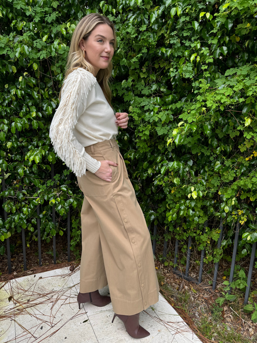 D.Exterior Fringe Sleeve Crew Sweater in Latte paired with Max Mara Weekend Caprile Button Side Pants in Beige available at Barbara Katz