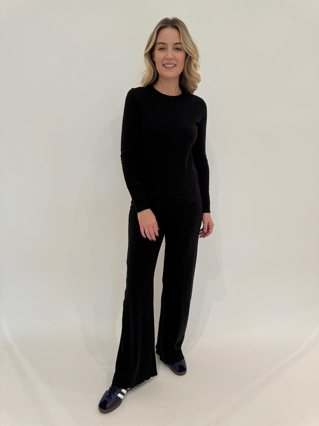 Goldie Stella Double-Faced Long Sleeve Top in Black/Charcoal paired with matching Stella Double-Faced Flare Pants available at Barbara Katz