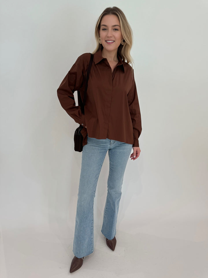 Repeat Blouse With Side End Slits in Brown paired with Frame LeEasy Flare Raw Fray Jeans, and Sol and Selene Divide & Conquer Woven Crossbody Bag in Chocolate