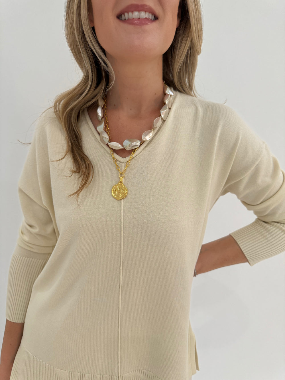 BK Selena Roll V-Neck Sweater in Ivory available at Barbara Katz