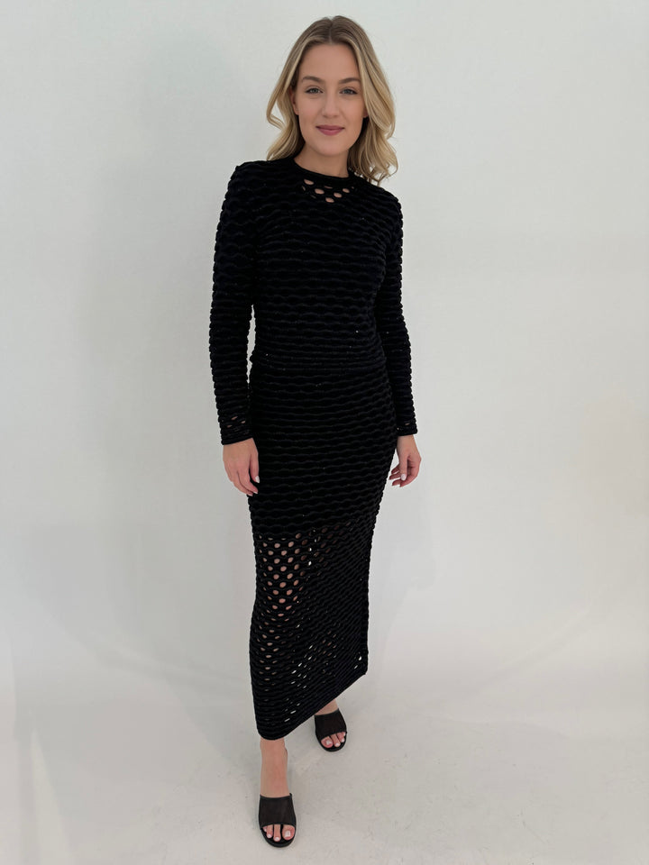 Maria Pavan Black Mira Crew Neck Wave Sequin Sweater paired with Lyra Wave Sequin Midi Skirt available at Barbara Katz