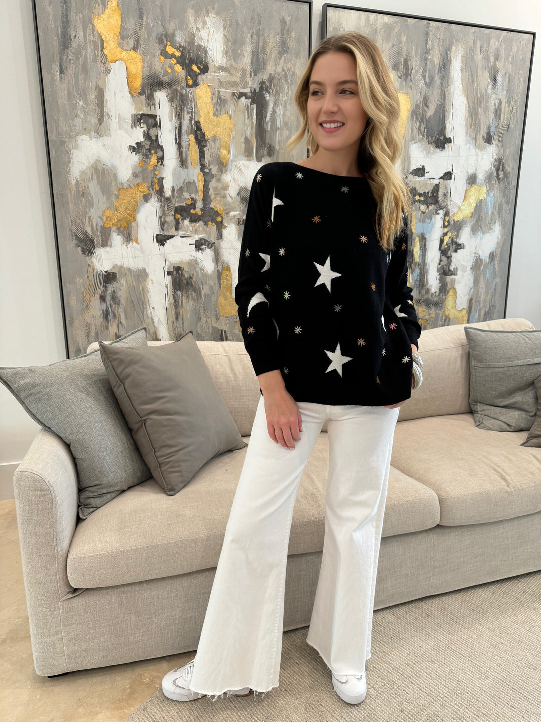 Zaket & Plover Starry Night Sweater in Black, paired with Mother The Roller Fray Jeans in White