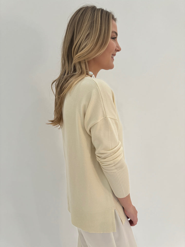 BK Selena Roll V-Neck Long Sleeve Sweater in Ivory available at Barbara Katz