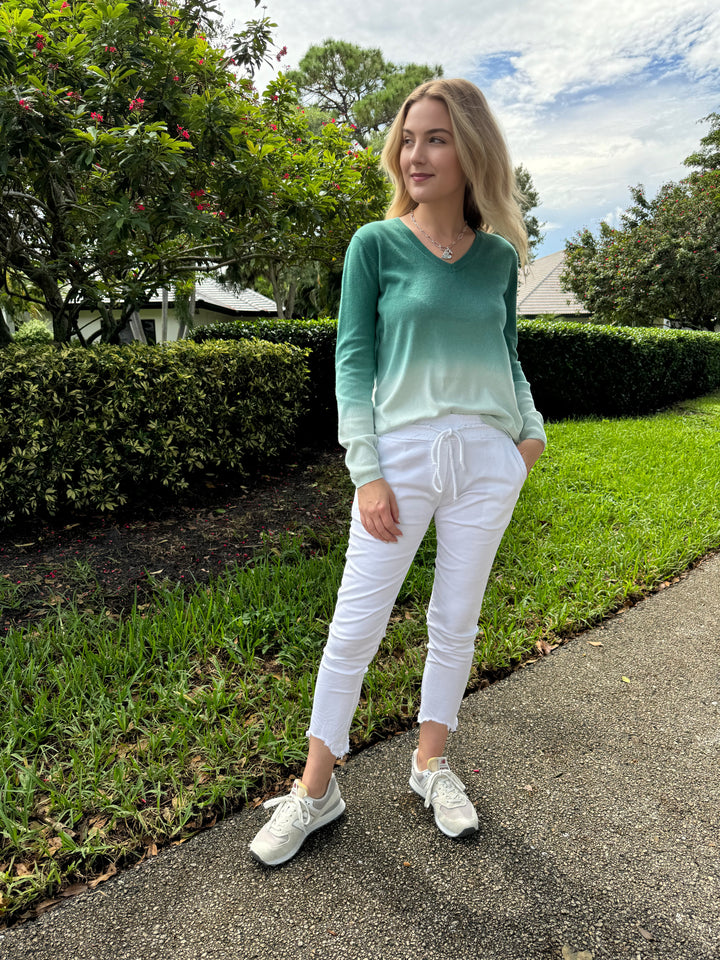 Elliott Lauren Lina Ombre V-Neck Sweater in Sea Salt paired with BK Kylie Distressed Fringe Hem Crinkle Jogger in White available at Barbara Katz