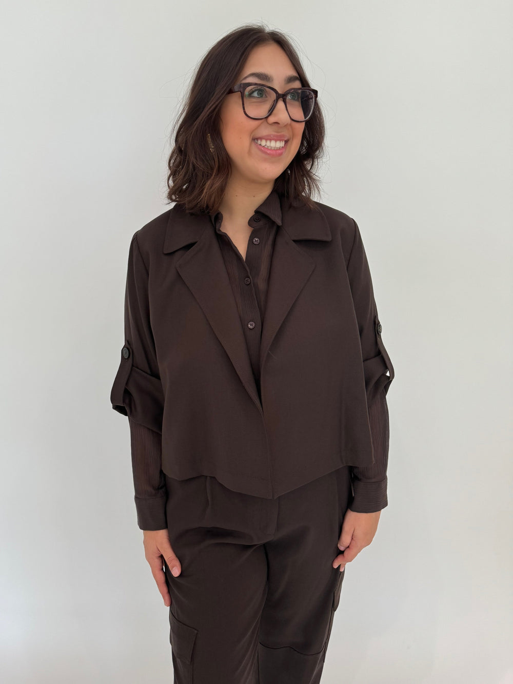 Marella Monochrome Dark Brown Vento Jacket with Orzo Sheer Blouse underneath, paired with Alisso Cargo Pants - all available at Barbara Katz