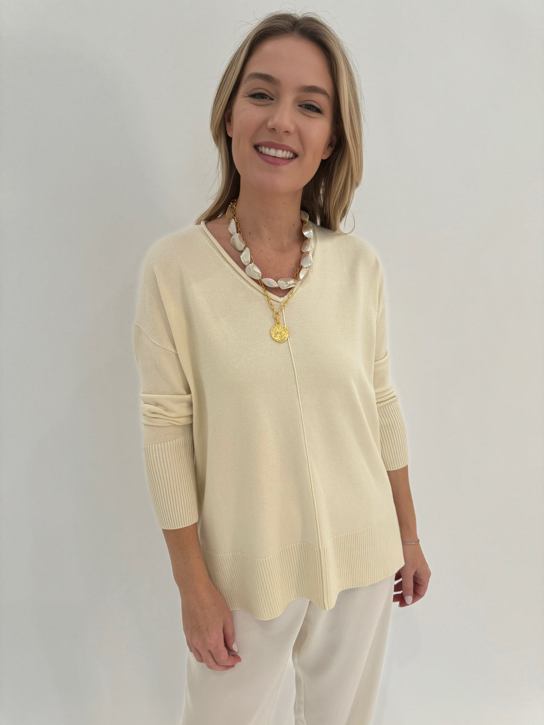 BK Selena Roll V-Neck Sweater in Ivory available at Barbara Katz