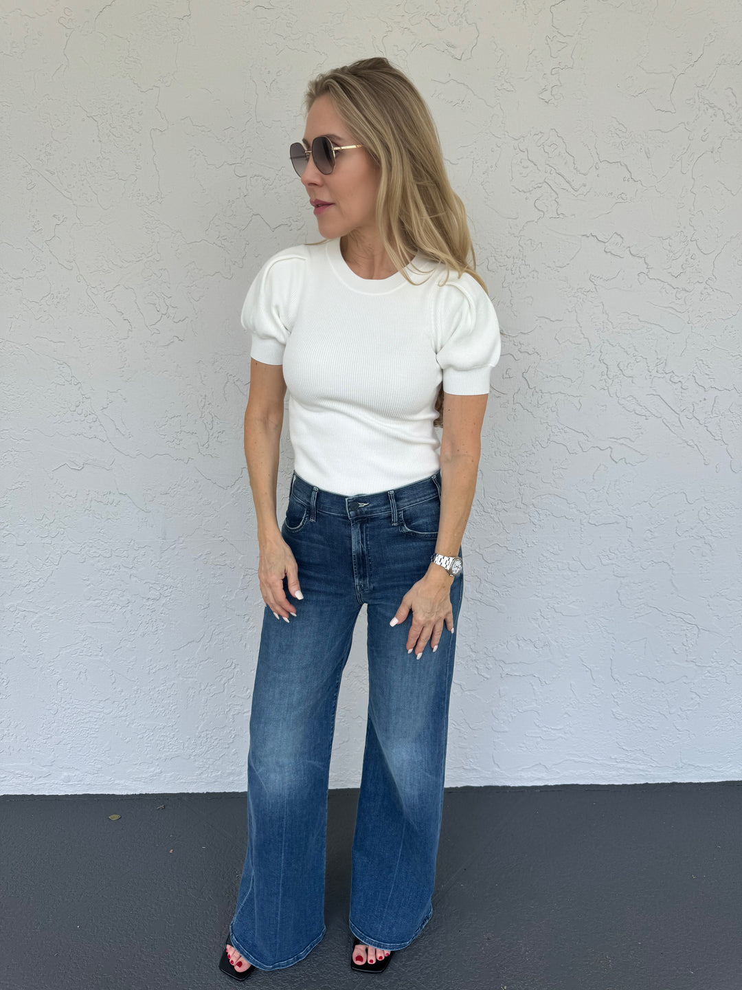 Model wearing Marella Anfora Sweater in White paired with Mother's The Hustler Roller Skimp Jeans