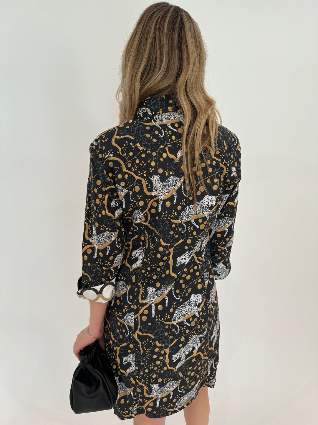 Dizzy-Lizzie Sag Harbor Shirt Dress in Black with Sleeping Cheetahs Print, shown with DeMellier Miami Clutch in Black Smooth available at Barbara Katz