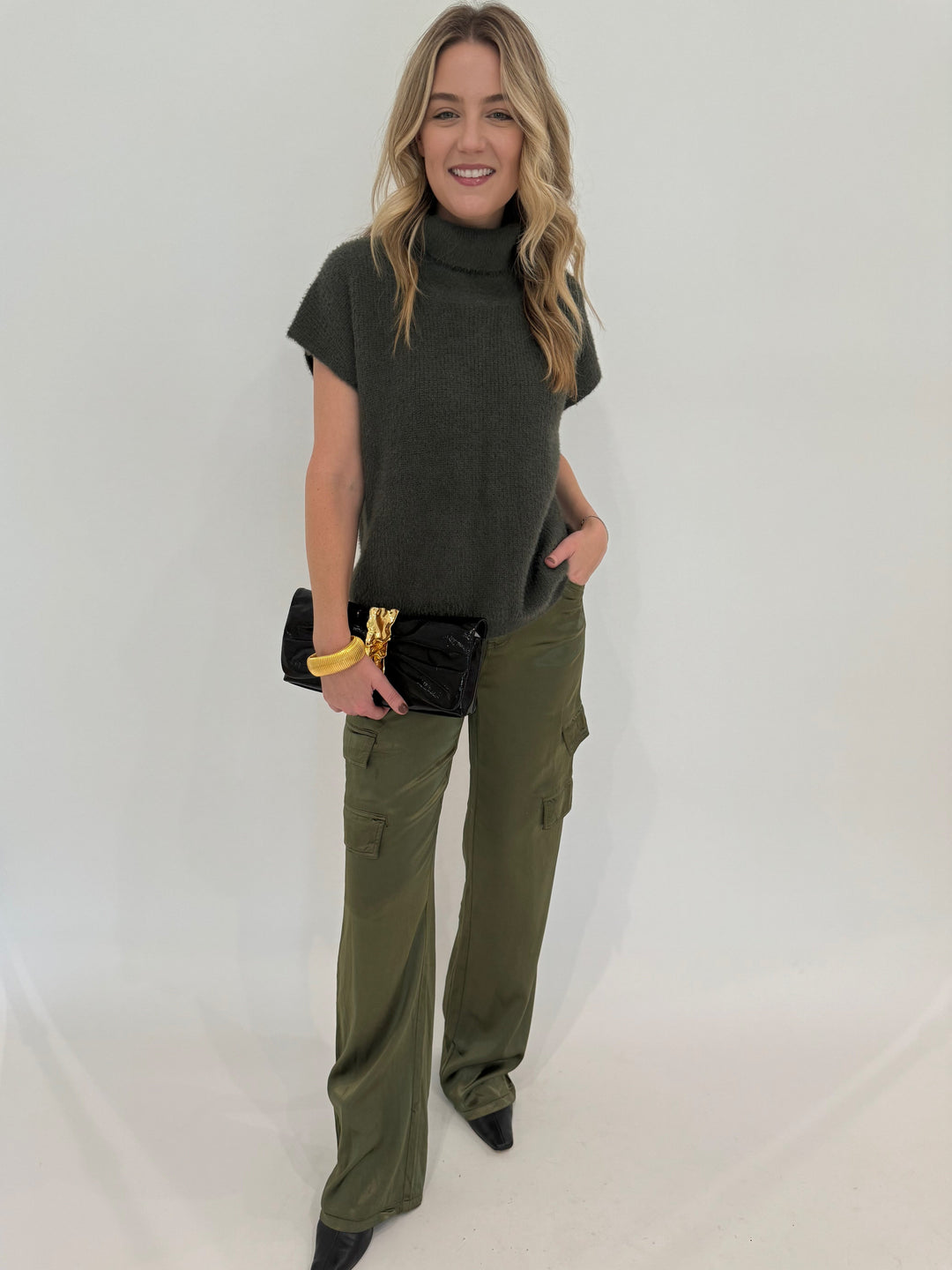 Melissa Nepton Jack Turtleneck Sweater in Winter Moss paired with Marrakech Zendaya Silky Cargo Pants in Pine available at Barbara Katz