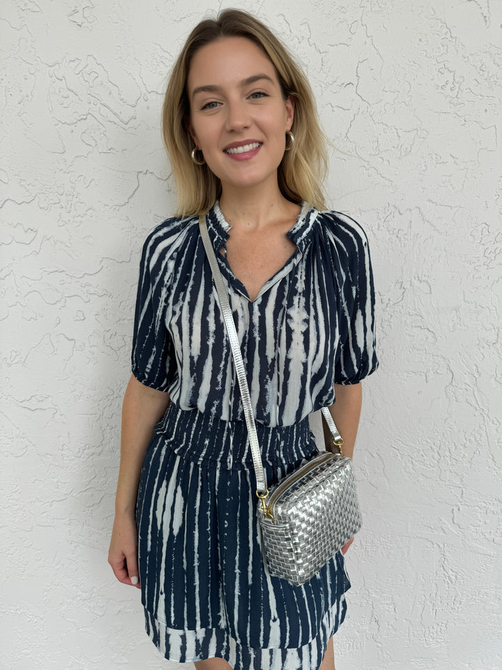 Rails Addison Pull-on Skirt paired with Laila Top in Indigo Nile, and Clare V Midi Sac Crossbody Bag in Silver Woven